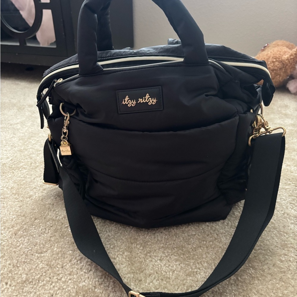 Itzy Ritzy Black Baby Bag with Adjustable Strap and Gold Accents